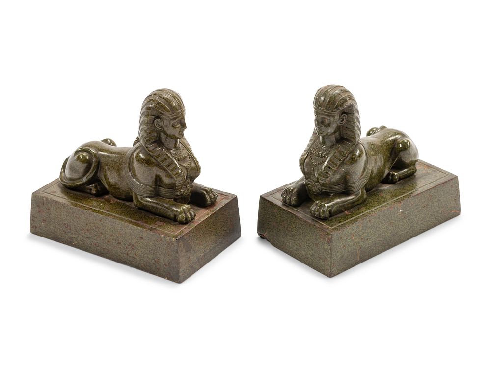 Appraisal: A Pair of Continental Patinated Metal Sphinxes A Pair of