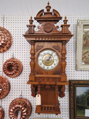 Appraisal: Fine German Oak Wall Clock carved with chimes lower shelf