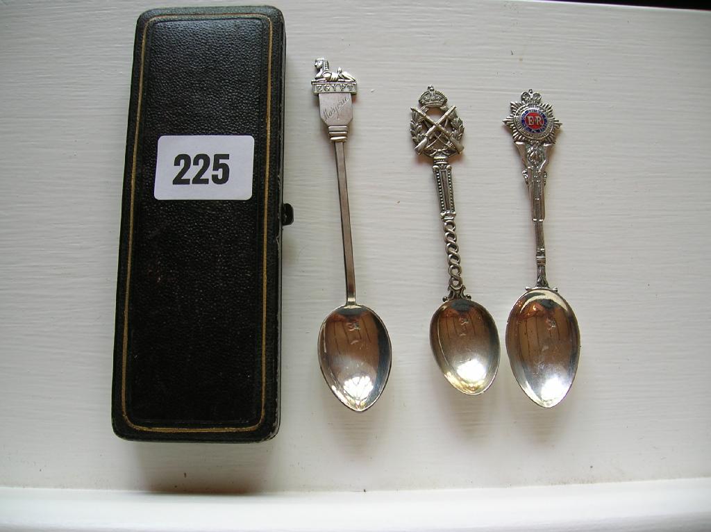 Appraisal: A silver spoon terminating in the Gloucester Regiment badge a