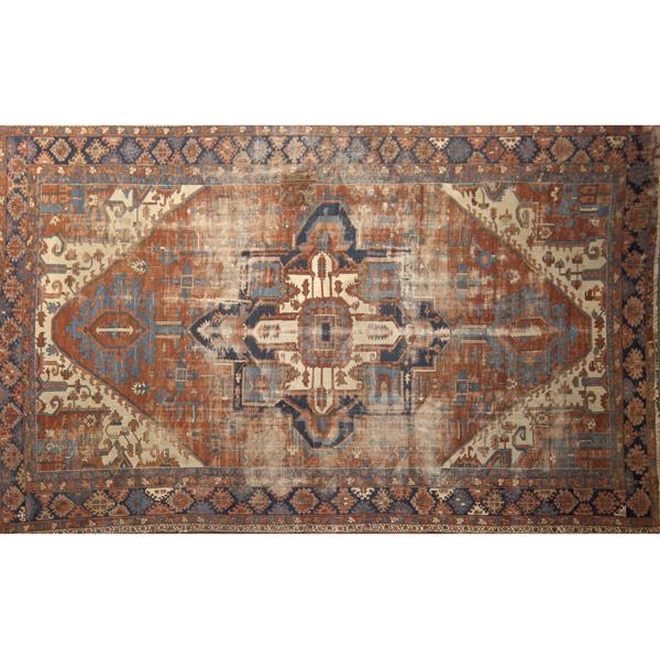 Appraisal: SERAPI Oriental carpet with large center medallion on rust colored