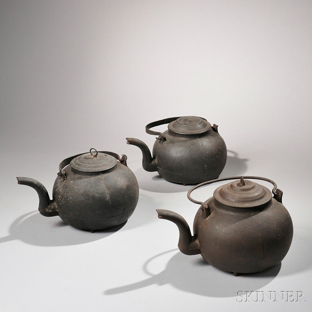 Appraisal: Three Cast Iron Hearth Kettles America late th early th