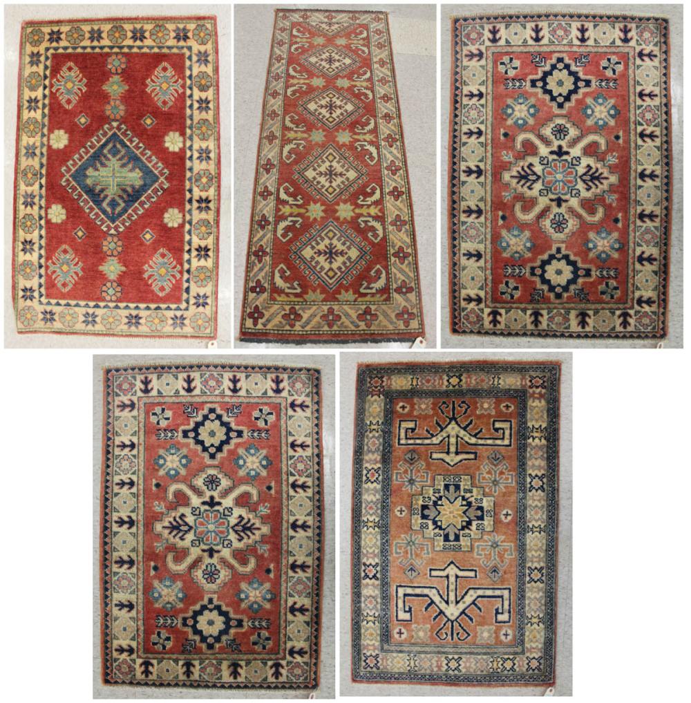 Appraisal: FIVE HAND KNOTTED ORIENTAL AREA RUGS Pakistani-Persian variety of patterns