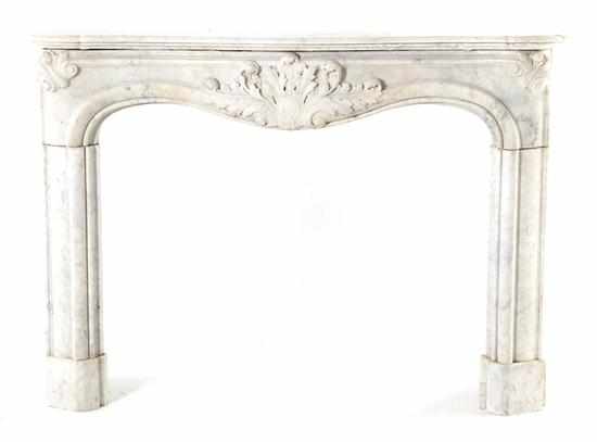 Appraisal: English or Continental carved marble fireplace surround th century serpentine