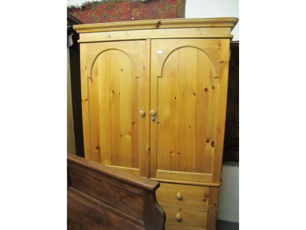 Appraisal: Pine two door wardrobe on chest