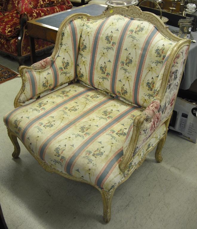 Appraisal: French th century style wide armchair with chinoiserie upholstered material