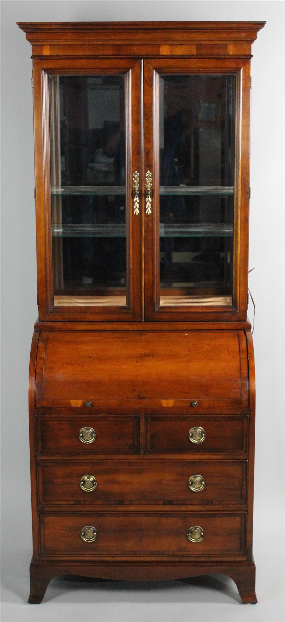 Appraisal: HEKMAN GEORGIAN STYLE SECRETARY WITH CYLINDER DESK IN TWO PARTS