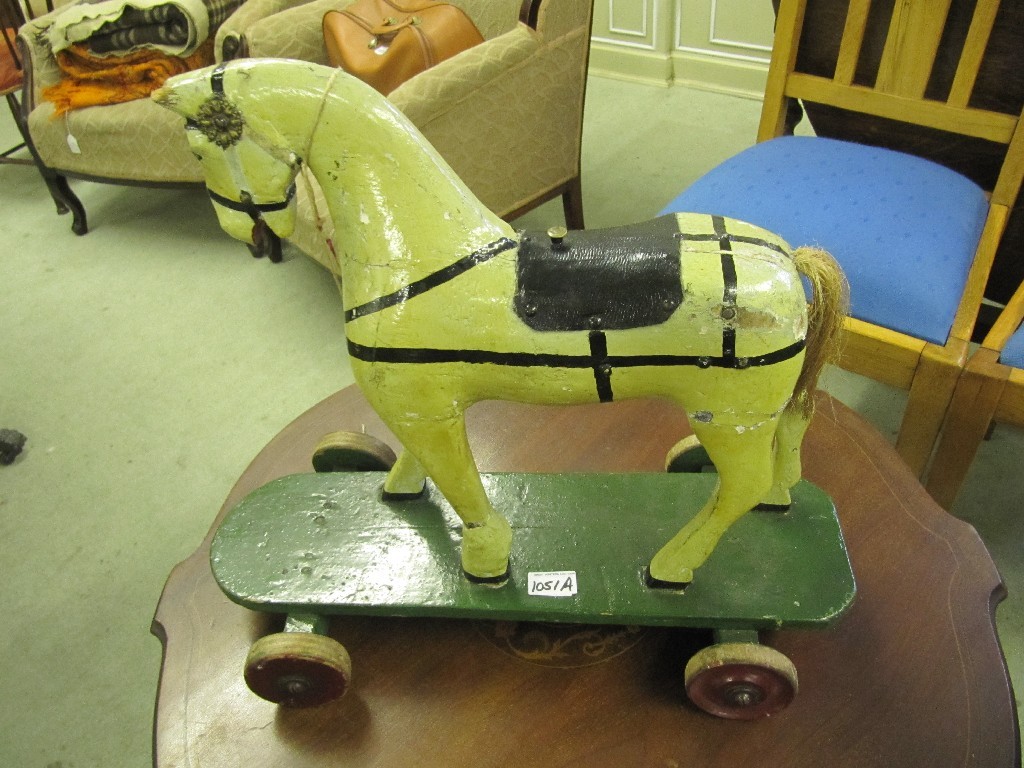 Appraisal: Pull along child's rocking horse