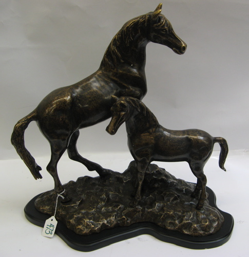 Appraisal: AN EQUESTRIAN SPELTER SCULPTURE of a mare and her foal