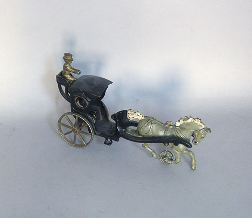 Appraisal: Cast iron horse and carriage toy long