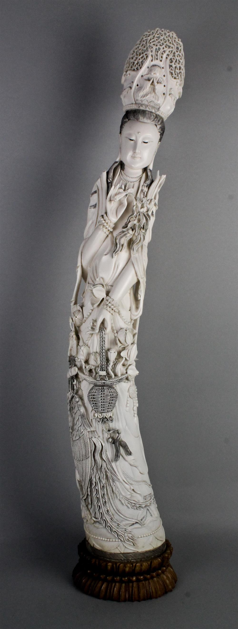 Appraisal: CHINESE IVORY TUSK FIGURE OF GUANYIN LATE TH TH C