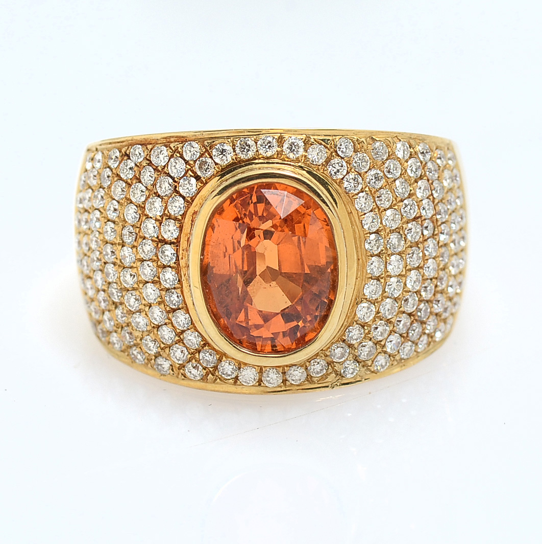 Appraisal: K ORANGE GARNET DIAMOND RING CT mixed cut spessartite ''mandarin''