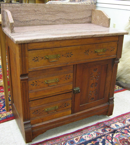 Appraisal: VICTORIAN MARBLE-TOP WASHSTAND Eastlake influence American c having a rectangular