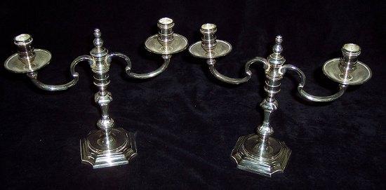 Appraisal: A pair of plated two-branch two-light table lights on baluster