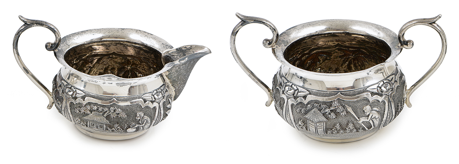 Appraisal: A THREE PIECE INDIAN SILVER TEA SET each piece decorated