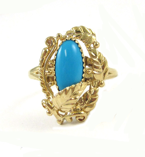 Appraisal: TURQUOISE AND FOURTEEN KARAT GOLD RING set with a single