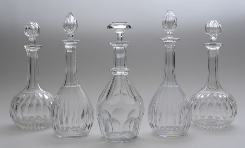 Appraisal: TWO PAIRS OF CUT-GLASS DECANTERS AND STOPPERS A SINGLE DECANTER