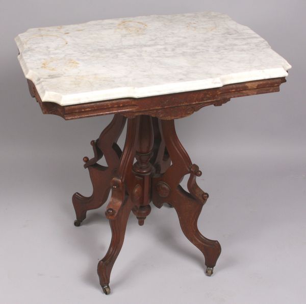 Appraisal: Victorian walnut marble top table h x w x d