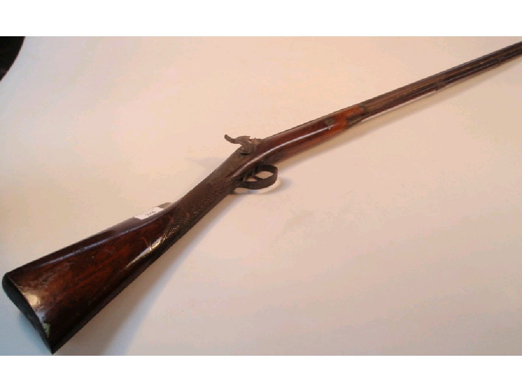 Appraisal: A bore sidelock percussion rifle marked DIXON with a walnut