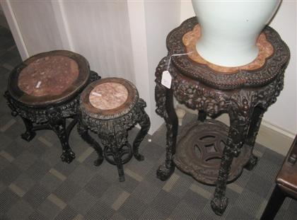 Appraisal: Three Chinese carved Hongmu and marble insert standslate th century