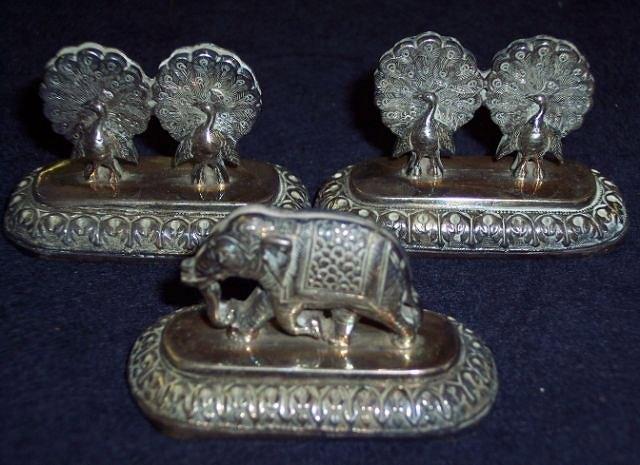 Appraisal: A pair of Indian white metal menu holders each set