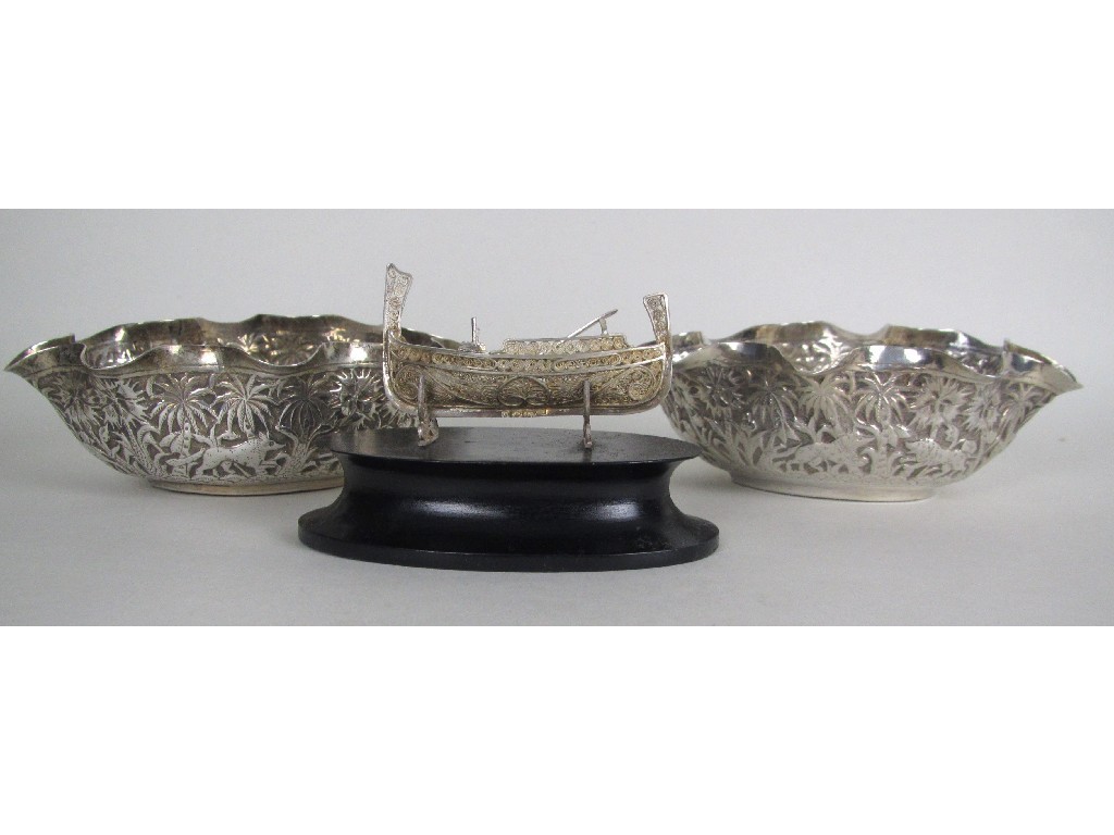 Appraisal: A pair of Indian white metal wavy rimmed salt cellars