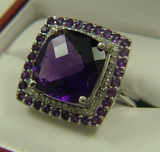 Appraisal: AMETHYST DIAMOND AND FOURTEEN KARAT GOLD RING the white gold