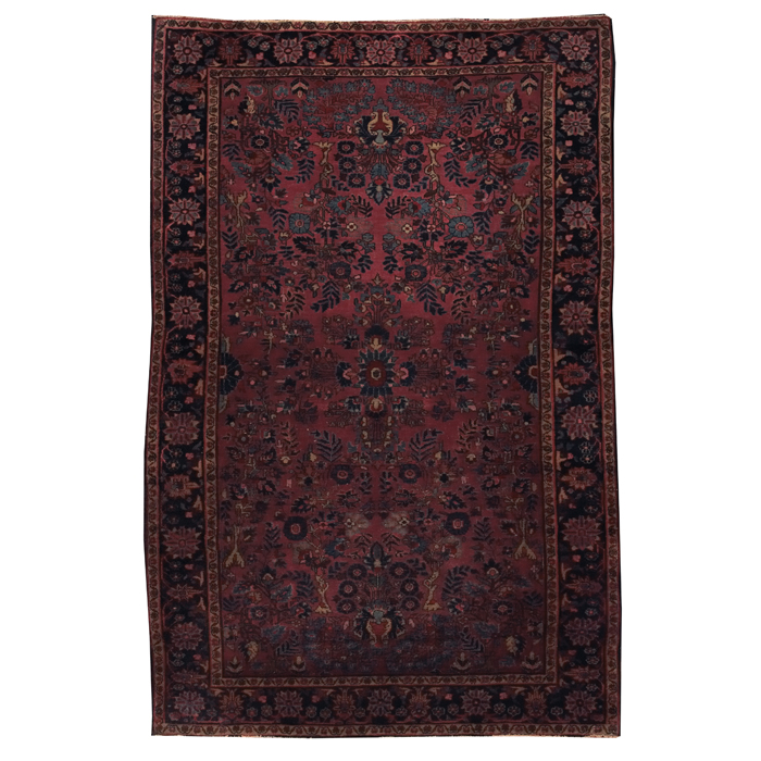 Appraisal: Persian Sarouk rug c stylizedfloral design on a red field