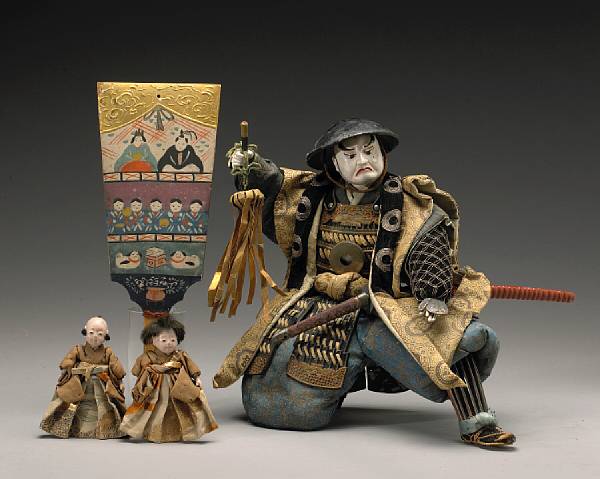 Appraisal: A large doll depicting a samurai warrior Taisho Showa Period