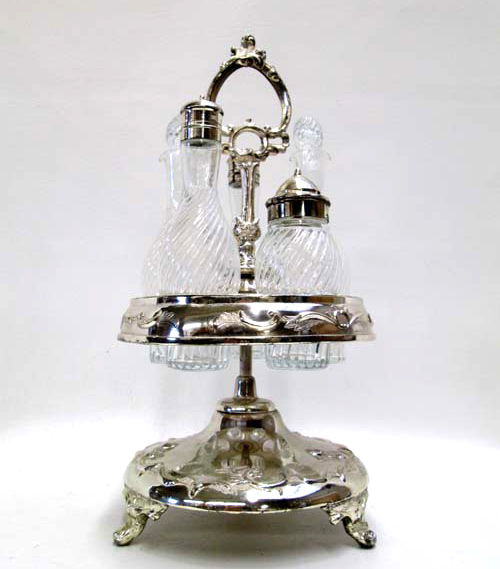 Appraisal: AMERICAN SILVERPLATED CASTOR SET having five clear patterned glass bottles