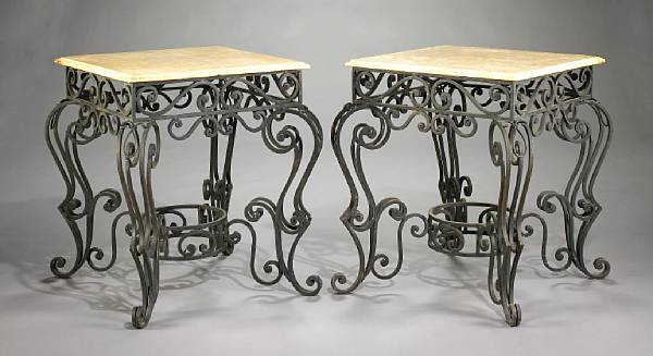 Appraisal: A pair of Baroque style wrought iron and marble tables