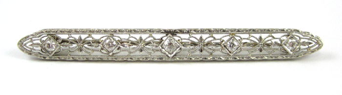 Appraisal: DIAMOND AND FOURTEEN KARAT GOLD BAR PIN The pierced white