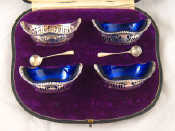 Appraisal: A set of four pierced silver salts one liner missing