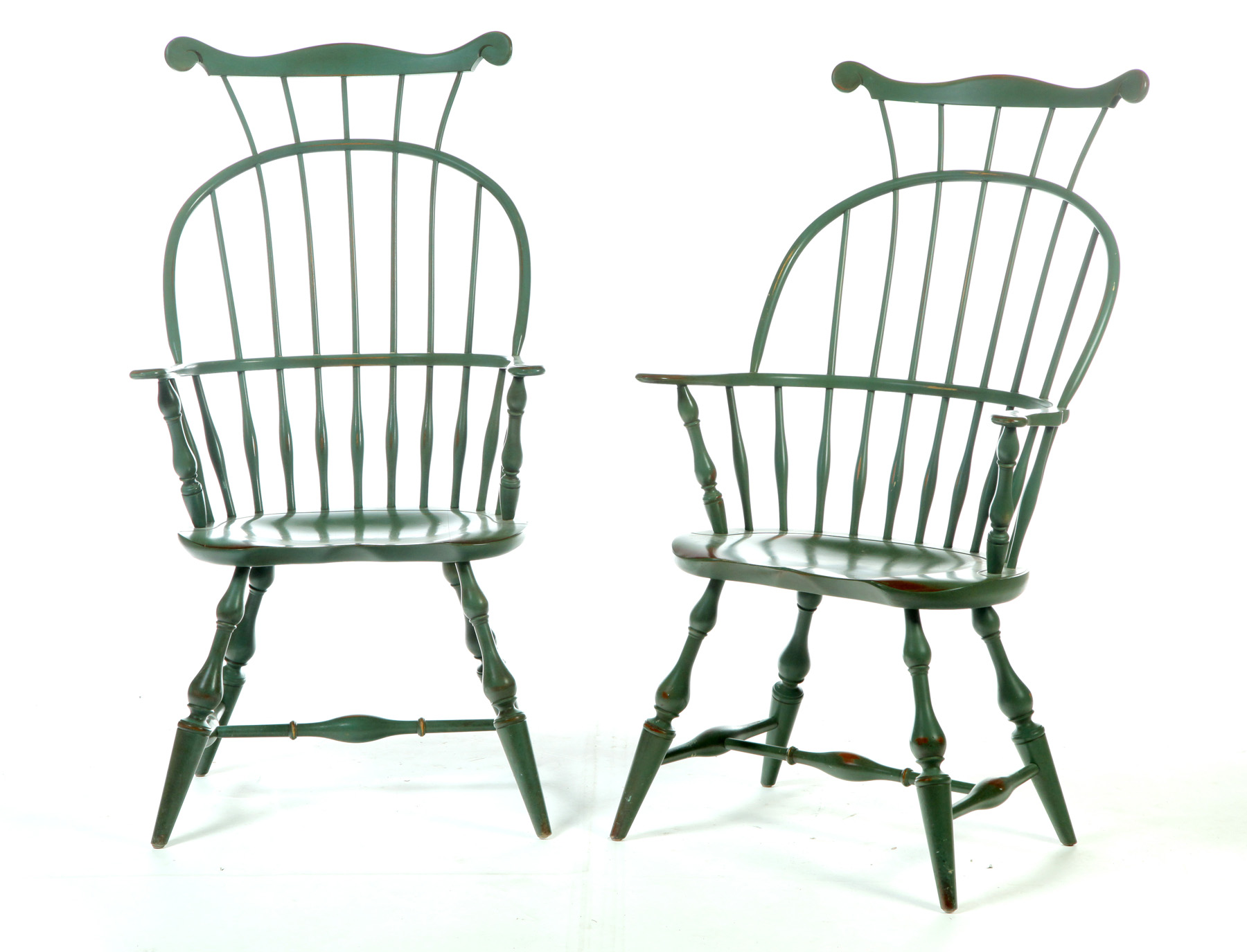 Appraisal: PAIR OF WINDSOR-STYLE COMB BACK ARM CHAIRS American rd quarter-