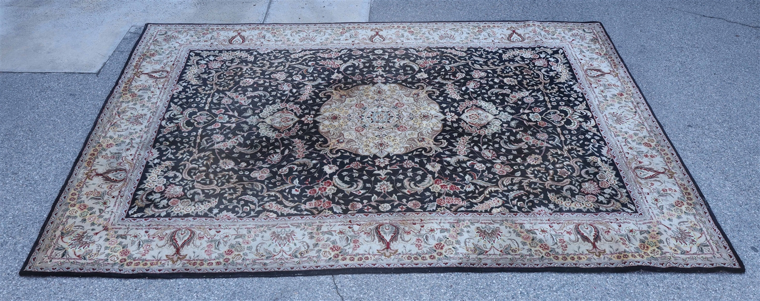 Appraisal: Persian wool rug with flowers and feathers on black background