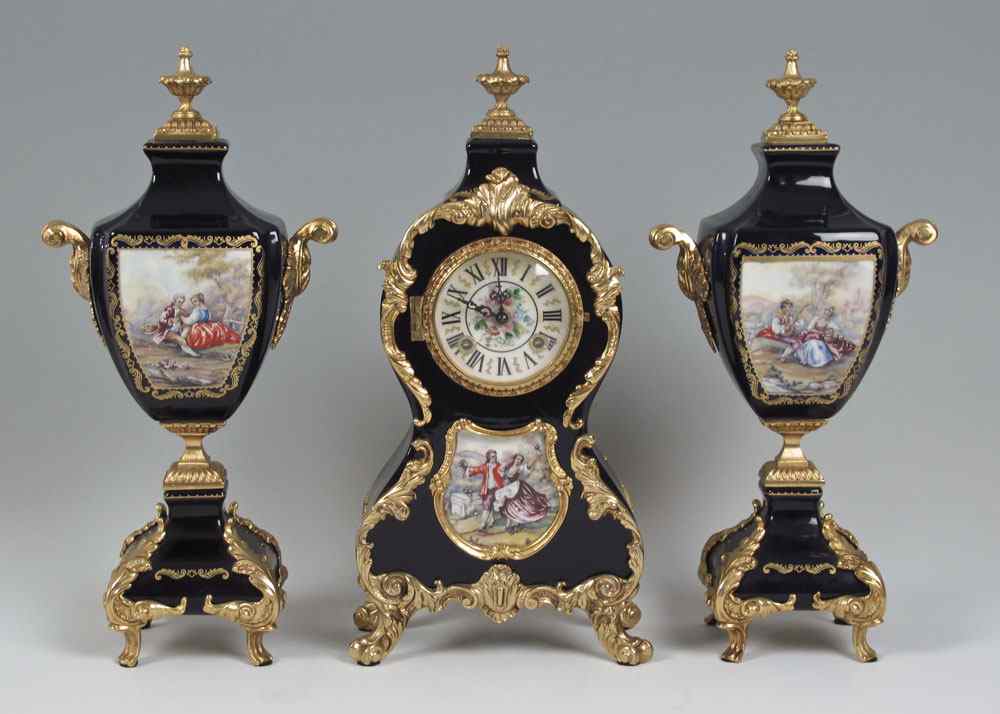 Appraisal: DECORATIVE PORCELAIN CLOCK GARNITURE SET Porcelain case clock with applied