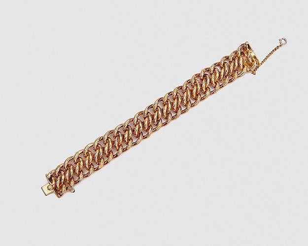 Appraisal: Yellow Gold Bracelet Yellow Gold Bracelet comprising pairs of curb