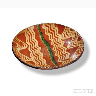 Appraisal: Slip-decorated Redware Dish southeastern Pennsylvania c round with coggled rim