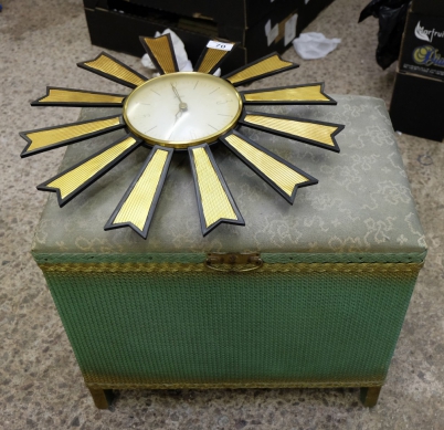 Appraisal: Lloyd loom blanket box and sunburst clock