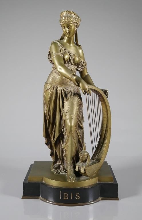 Appraisal: Cast metal statue of a woman with a harp in