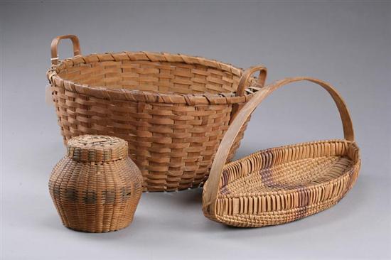 Appraisal: THREE BASKETS American late th-early th century woven splint Largest