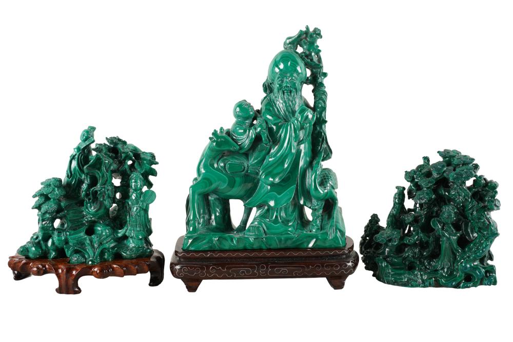 Appraisal: THREE CHINESE MALACHITE CARVINGSwith two wooden stands largest inches high