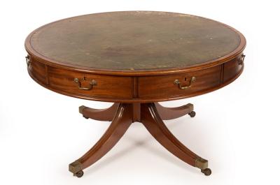 Appraisal: A mahogany circular drum library table the moulded top with