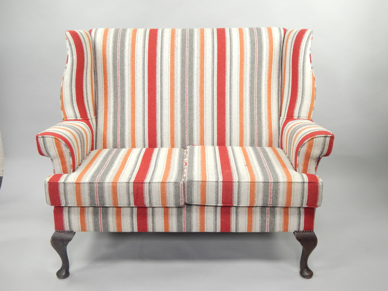 Appraisal: A Victorian two seater settee reupholstered in striped cotton fabric