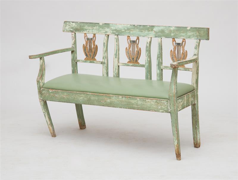 Appraisal: ITALIAN NEOCLASSICAL GREEN PAINTED AND PARCEL-GILT TRIPLE CHAIR-BACK SETTEE With