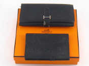 Appraisal: Vintage Hermes A purse wallet and a folding notebook cover