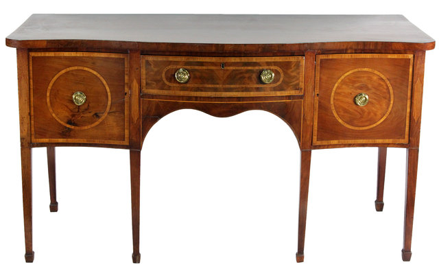 Appraisal: A George III mahogany serpentine sideboard circa the crossbanded top