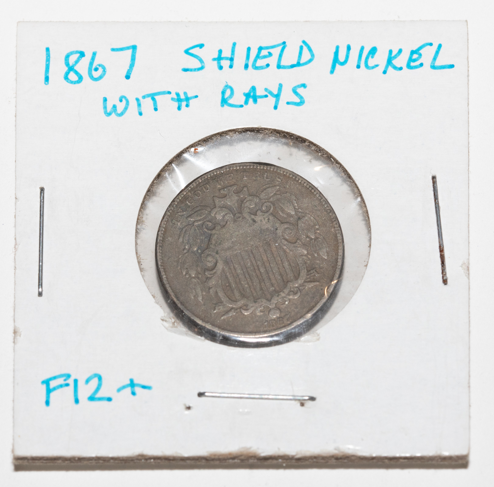 Appraisal: WITH RAYS SHIELD NICKEL F NET VG Some corrosion on