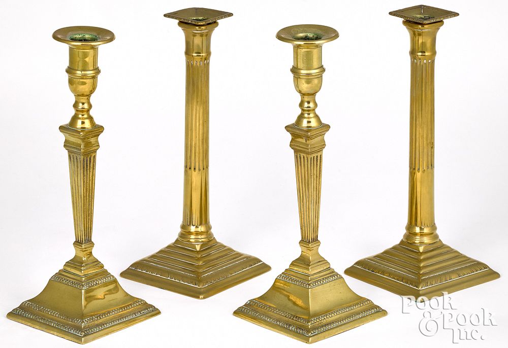 Appraisal: Two pairs of English columnar brass candlesticks Two pairs of