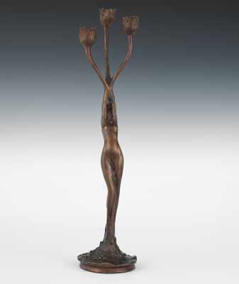 Appraisal: A Figural Bronze Candleholder After Harry Bates Stamped in the