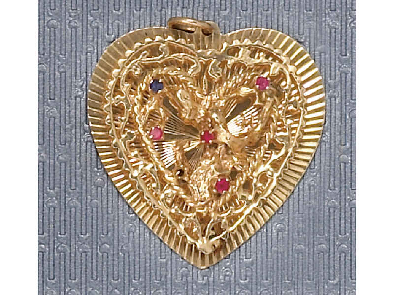 Appraisal: GOLD CHARM k yellow gold charm with a heart design